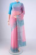 Pink Tussar Silk Saree with Plain Body and Temple Border.  displayed on a mannequin
