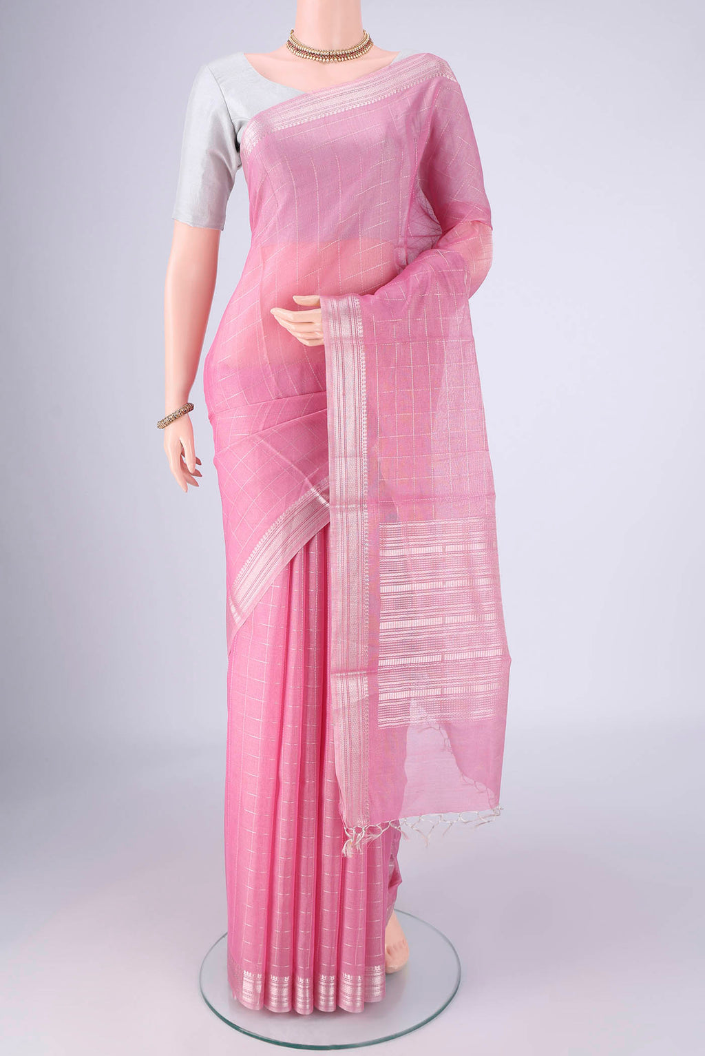 Pink MP Tussar Saree with Checked design on the body and Zari Border.  displayed on a mannequin