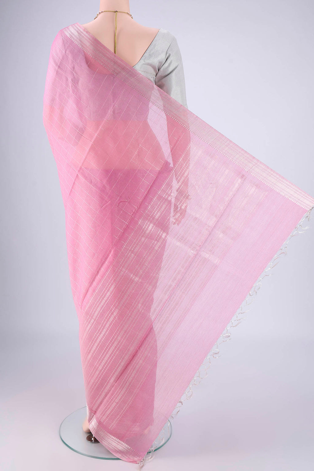 Flat view of Pink MP Tussar Saree with Checked design on the body and Zari Border. 