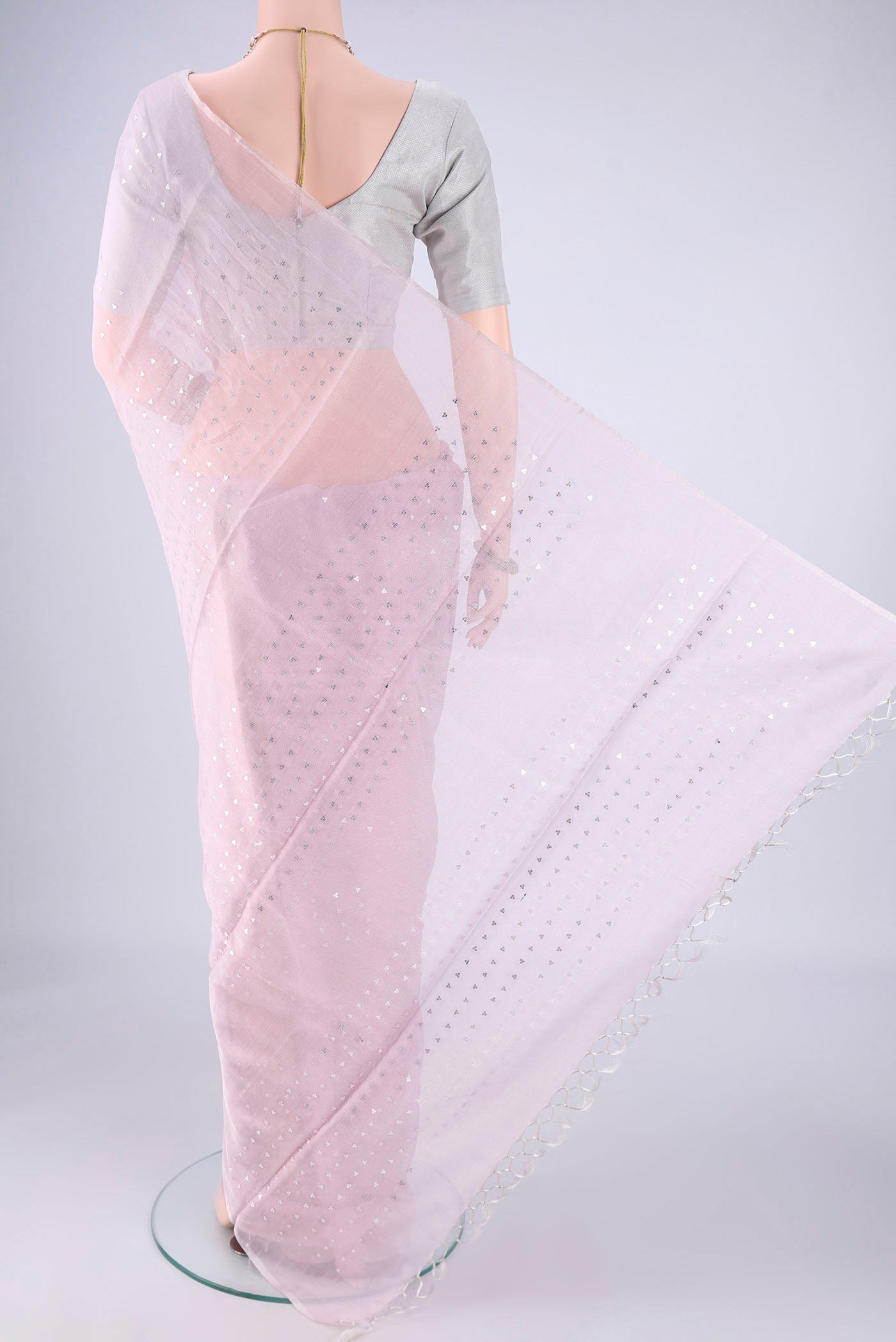 Flat view of Rose pink MP Tussar Saree with Embroidery on the body and Thin Zari Line. 