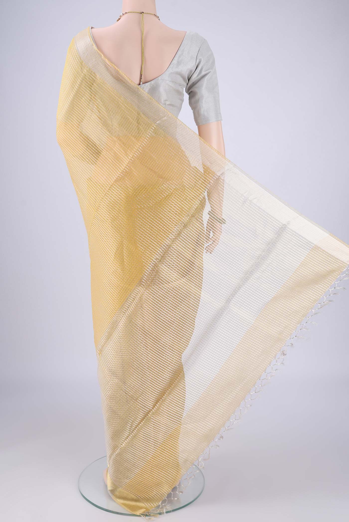 Flat view of Lemon Yellow MP Tussar Saree with Checked design on the body and Zari Border. 