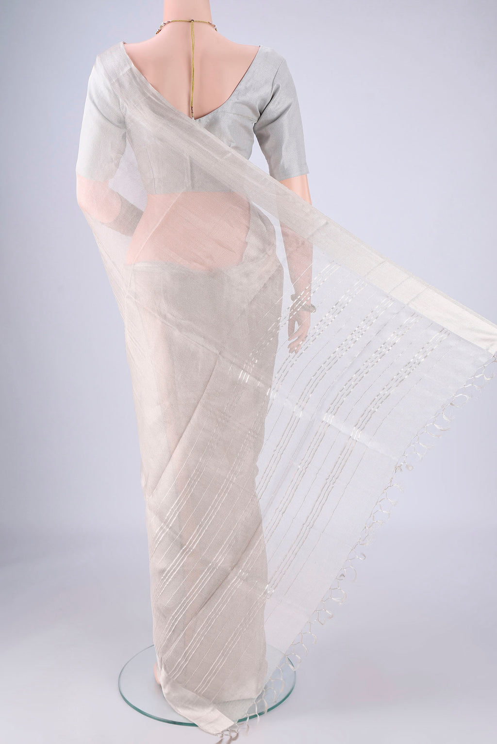 Flat view of Silver MP Tussar Saree with Plain Body and Zari Border. 