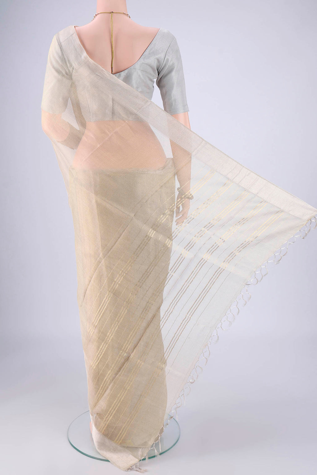 Flat view of Golden MP Tussar Saree with Plain Body and Zari Border. 