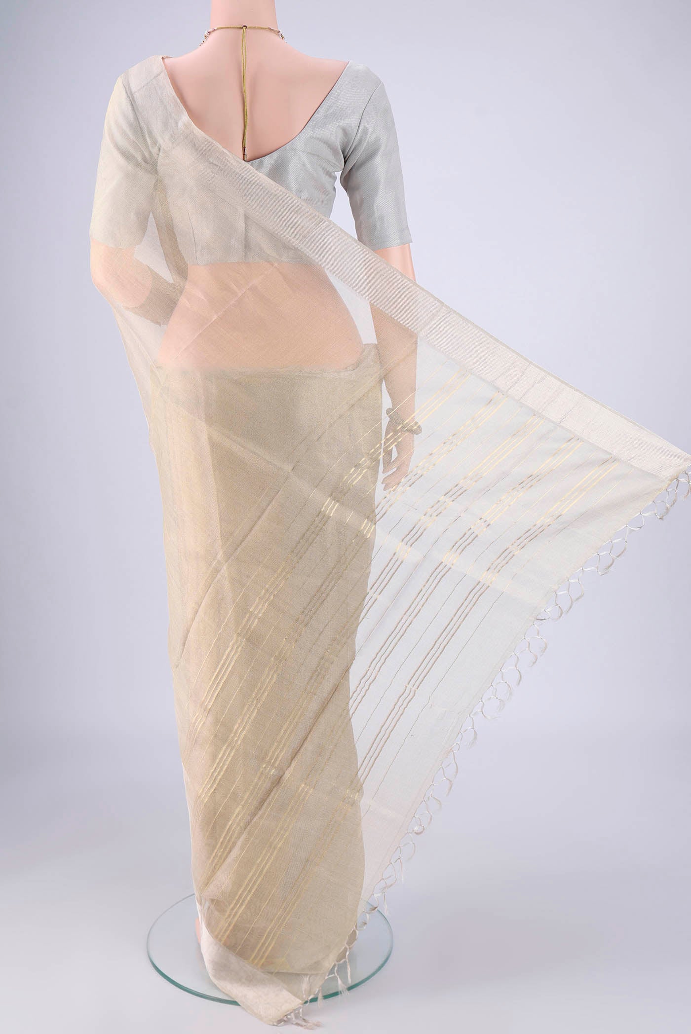 Flat view of Golden MP Tussar Saree with Plain Body and Zari Border. 