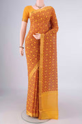 Yellow Mangalagiri Cotton Saree with Printed design on the body and Zari Border.  displayed on a mannequin