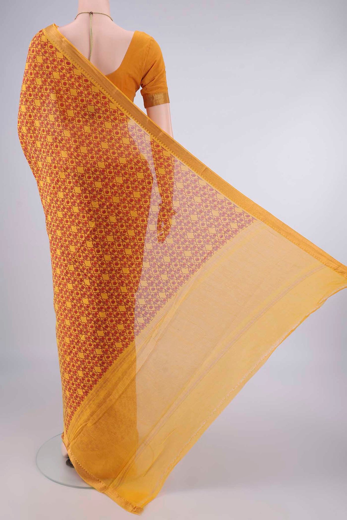 Flat view of Yellow Mangalagiri Cotton Saree with Printed design on the body and Zari Border. 