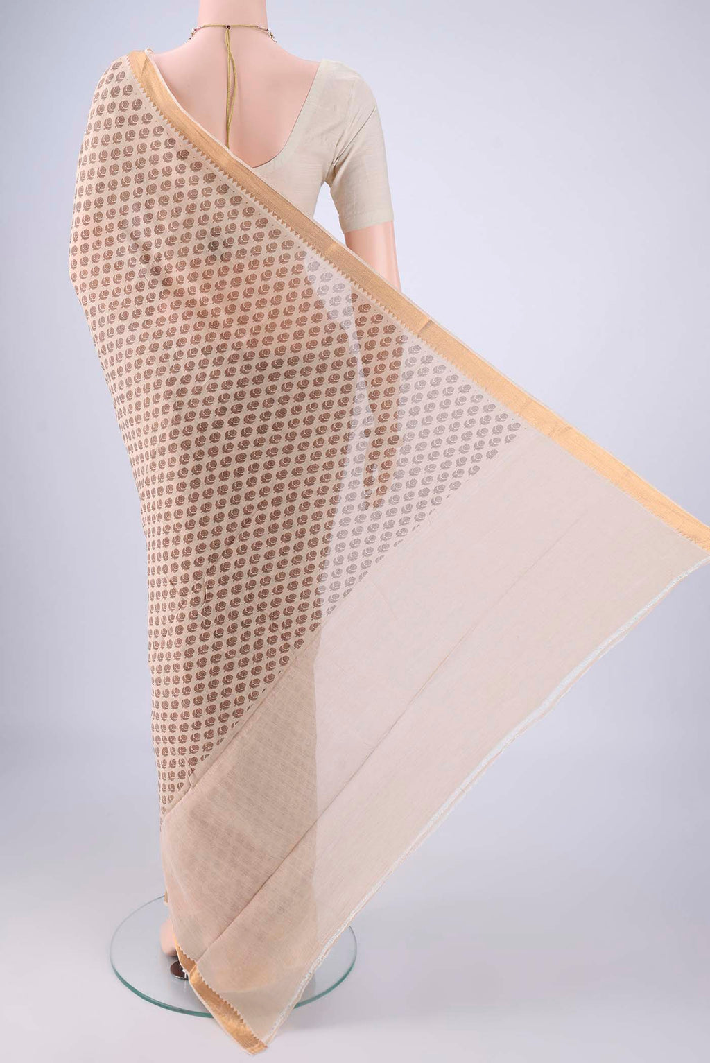 Flat view of Beige Mangalagiri Cotton Saree with Printed design on the body and Zari Border. 