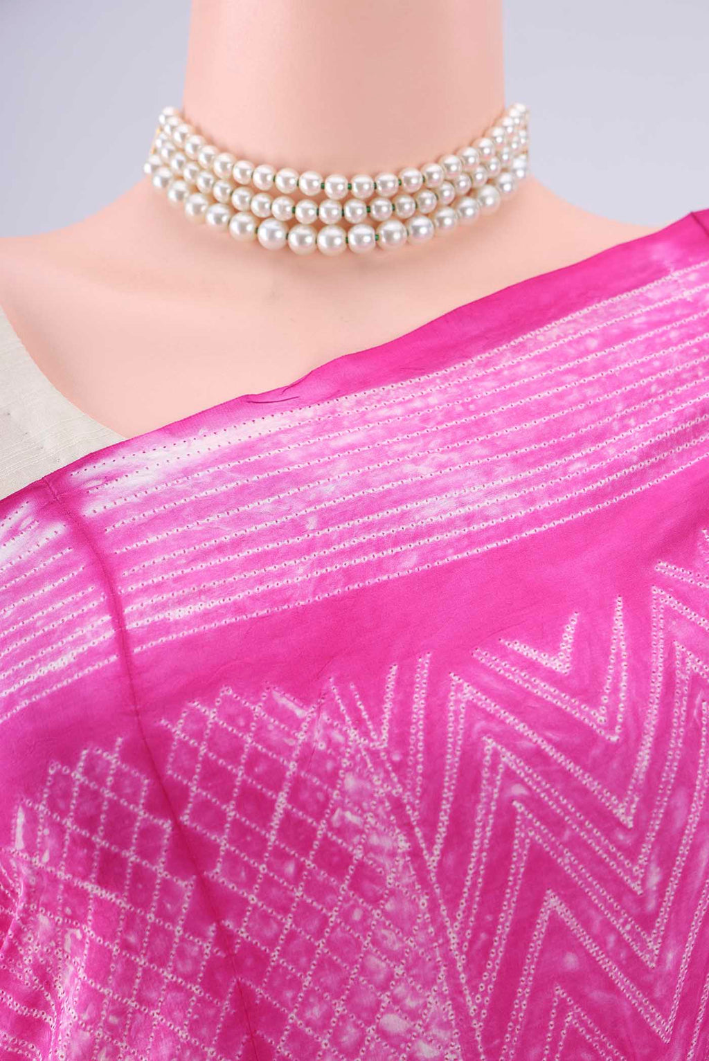Border image of Pure Silk Rani Pink Printed Saree with Printed design on the body and Printed Border. 