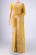 Yellow Mysore Crepe Saree with Zari Brocade on the body and Zari Border.  displayed on a mannequin