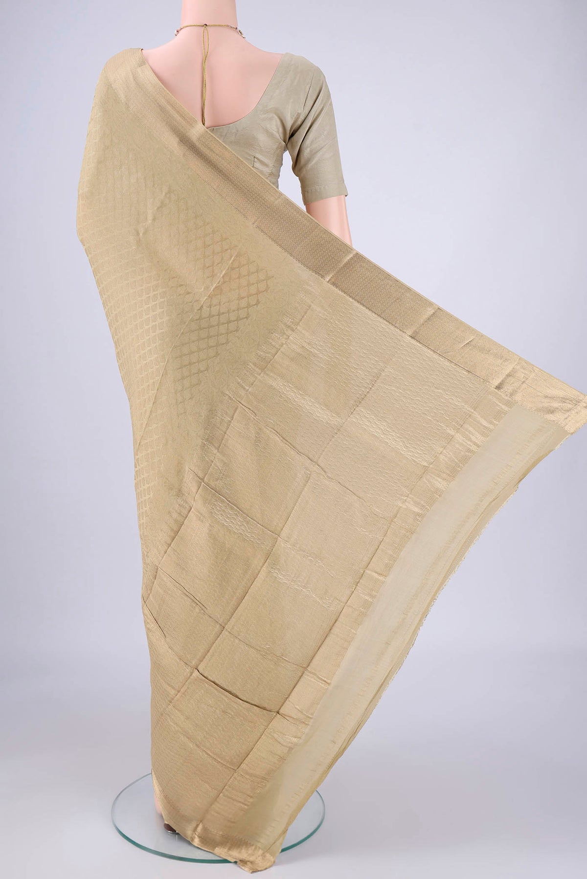 Flat view of Dark Beige Mysore Crepe Saree with Zari Brocade on the body and Zari Border. 