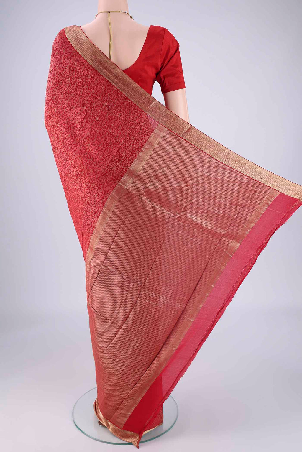 Flat view of Red Mysore Crepe Saree with Zari Brocade on the body and Zari Border. 