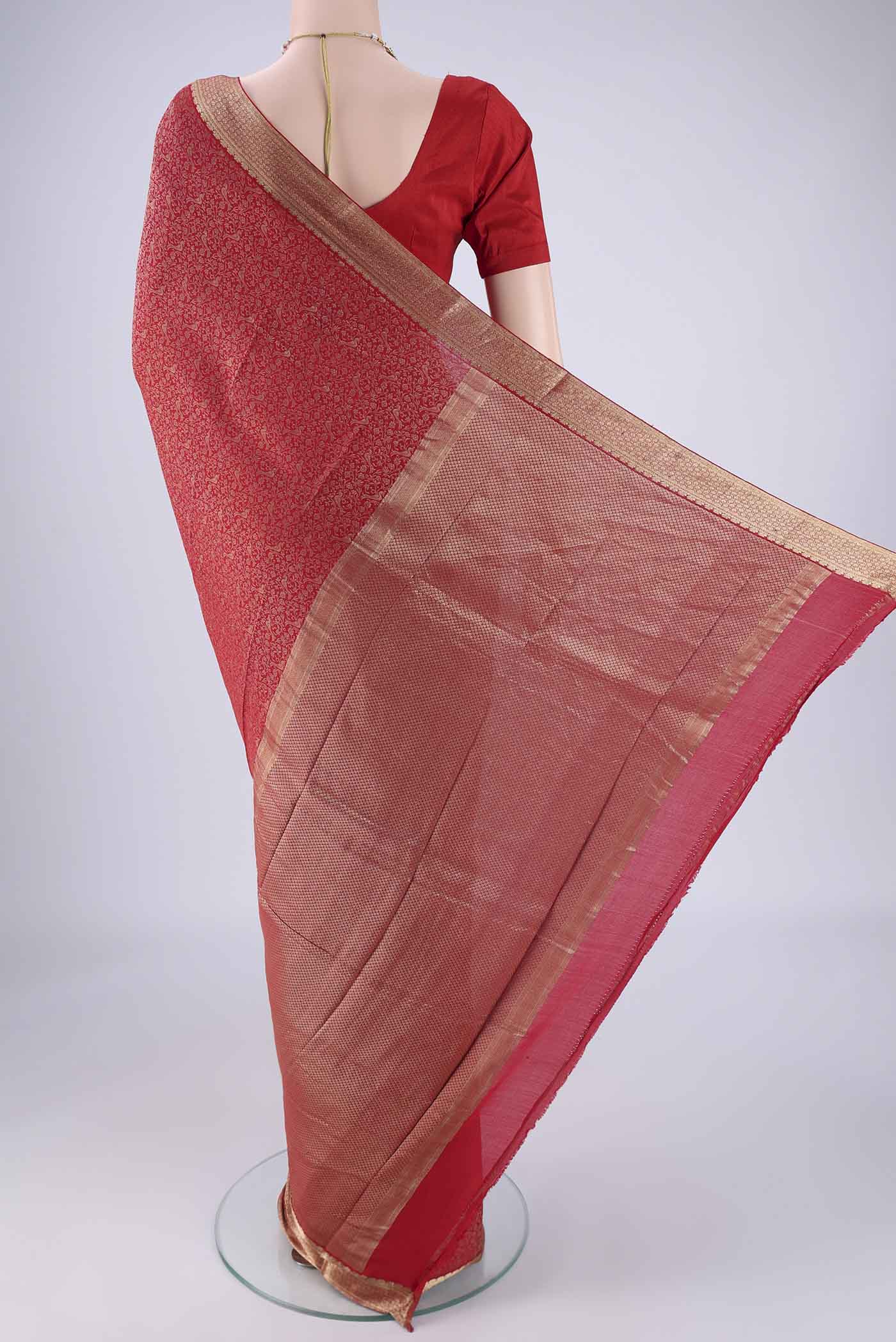 Flat view of Red Mysore Crepe Saree with Zari Brocade on the body and Zari Border. 