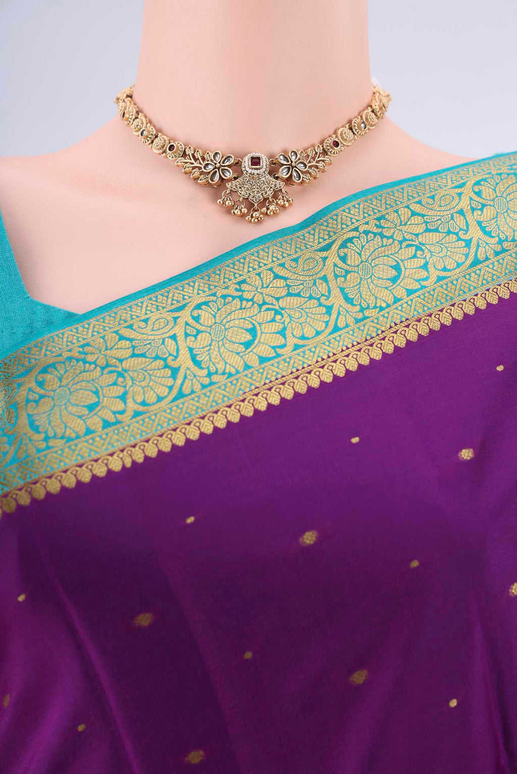 Border image of Purple Mysore Crepe Saree with Zari Butta on the body and Zari Border. 