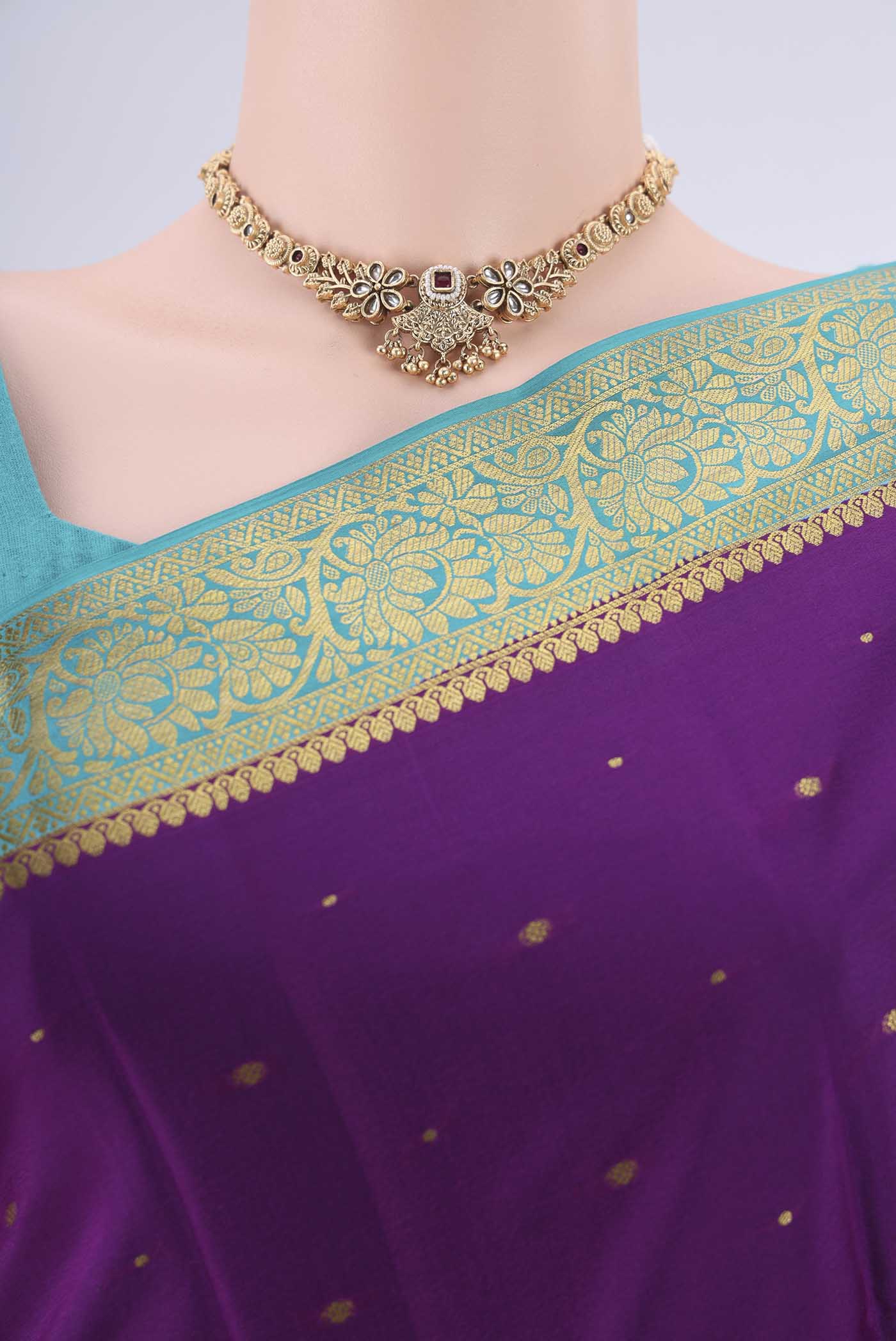 Border image of Purple Mysore Crepe Saree with Zari Butta on the body and Zari Border. 