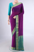 Purple Mysore Crepe Saree with Zari Butta on the body and Zari Border.  displayed on a mannequin