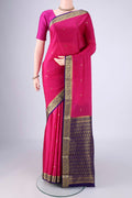 Rani Pink Mysore Crepe Saree with Zari Butta on the body and Zari Border.  displayed on a mannequin