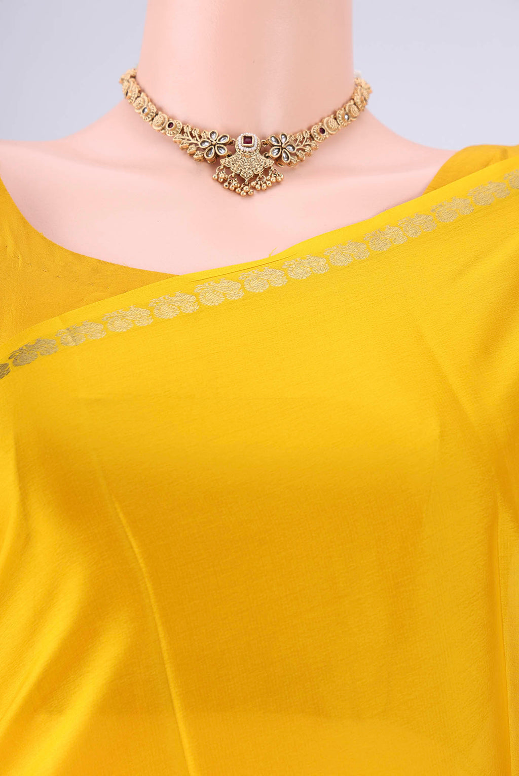 Border image of Lemon Yellow Mysore Crepe Saree with Plain Body and Zari Border. 