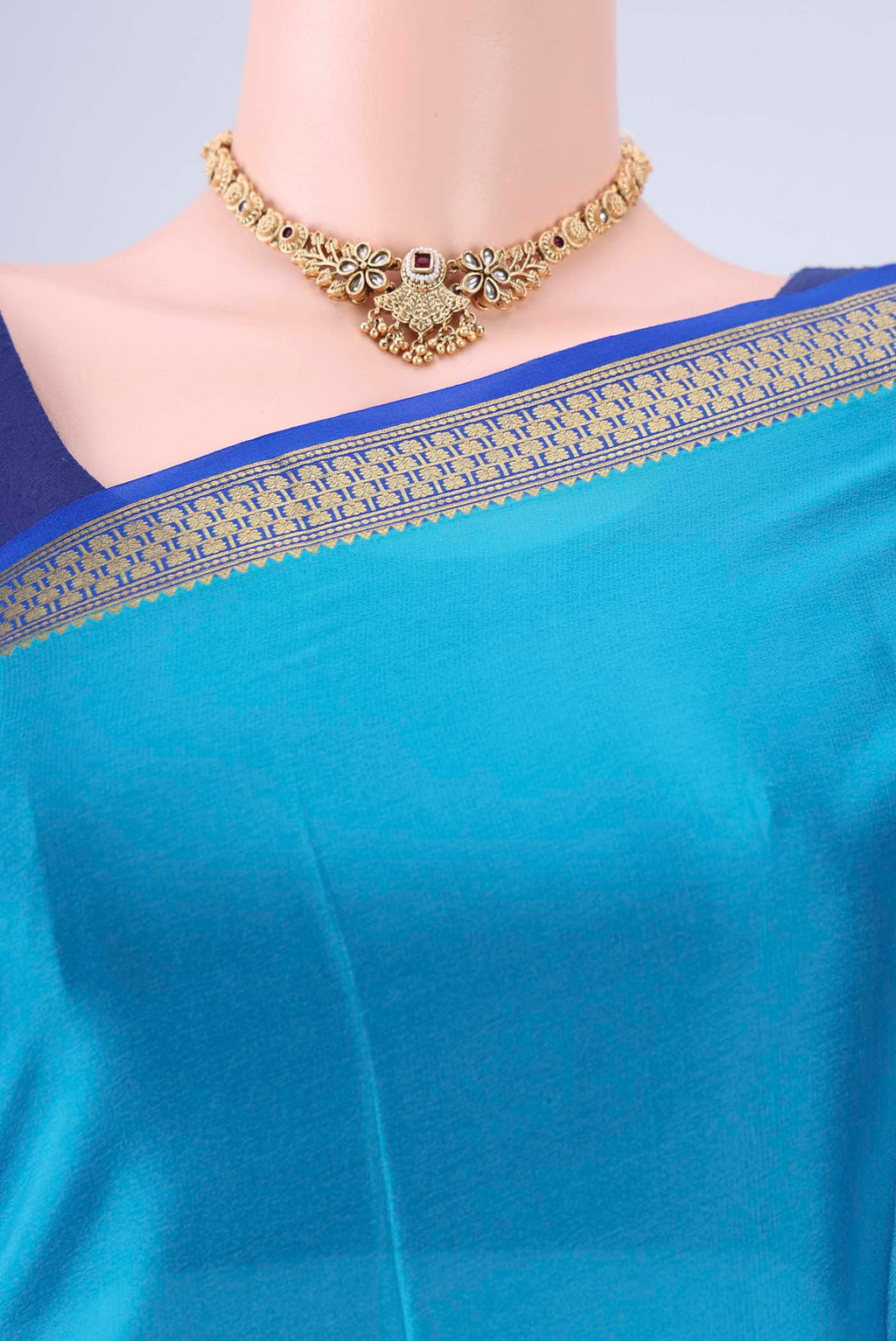 Border image of Blue Mysore Crepe Saree with Plain Body and Zari Border. 