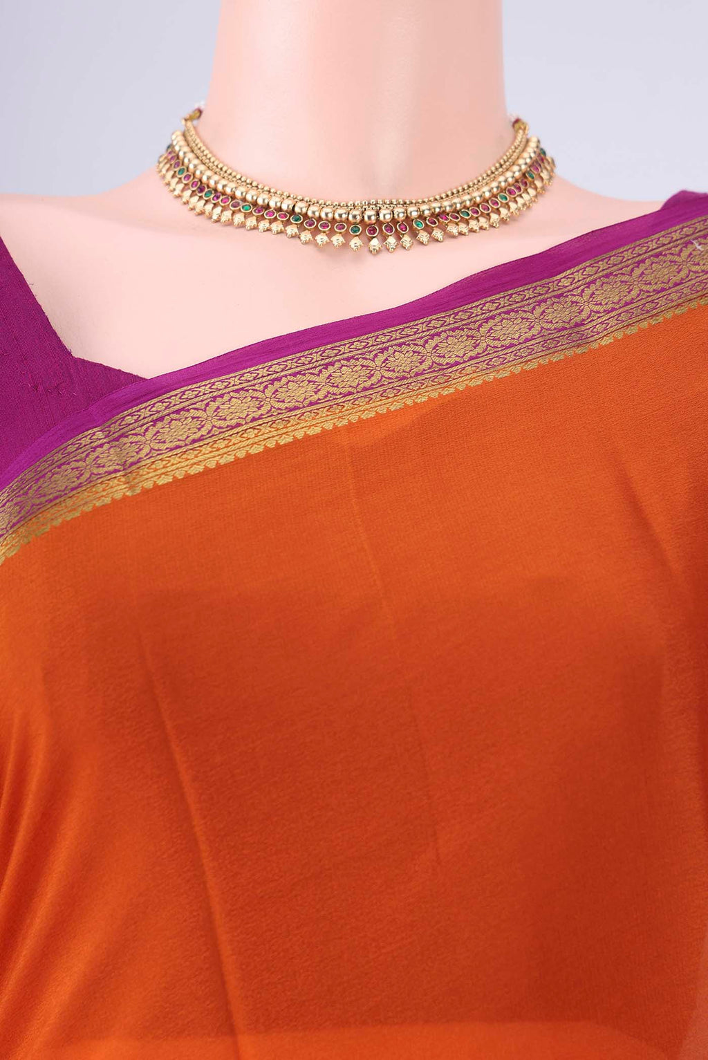 Border image of Orange Mysore Crepe Saree with Plain Body and Zari Border. 