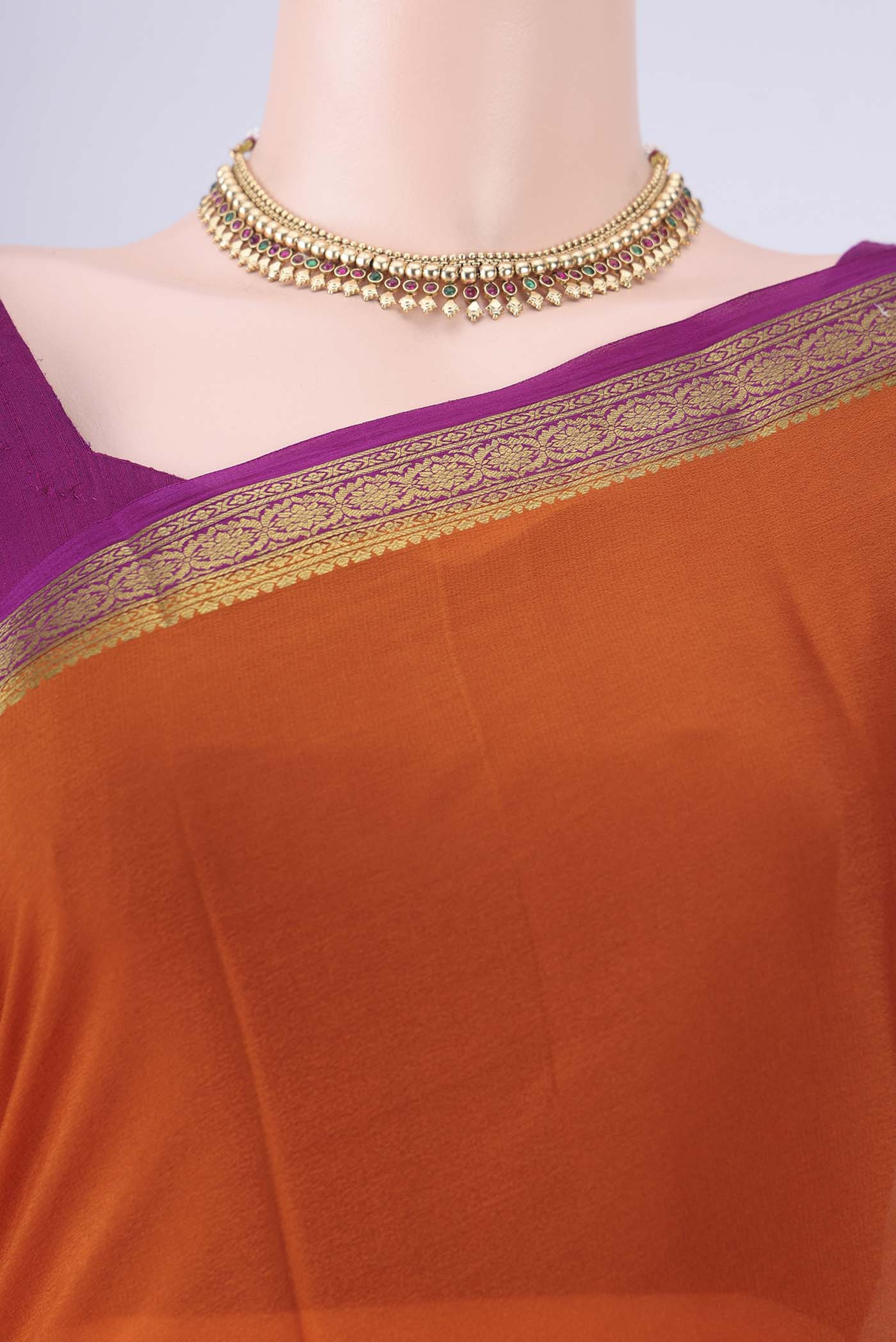Border image of Orange Mysore Crepe Saree with Plain Body and Zari Border. 