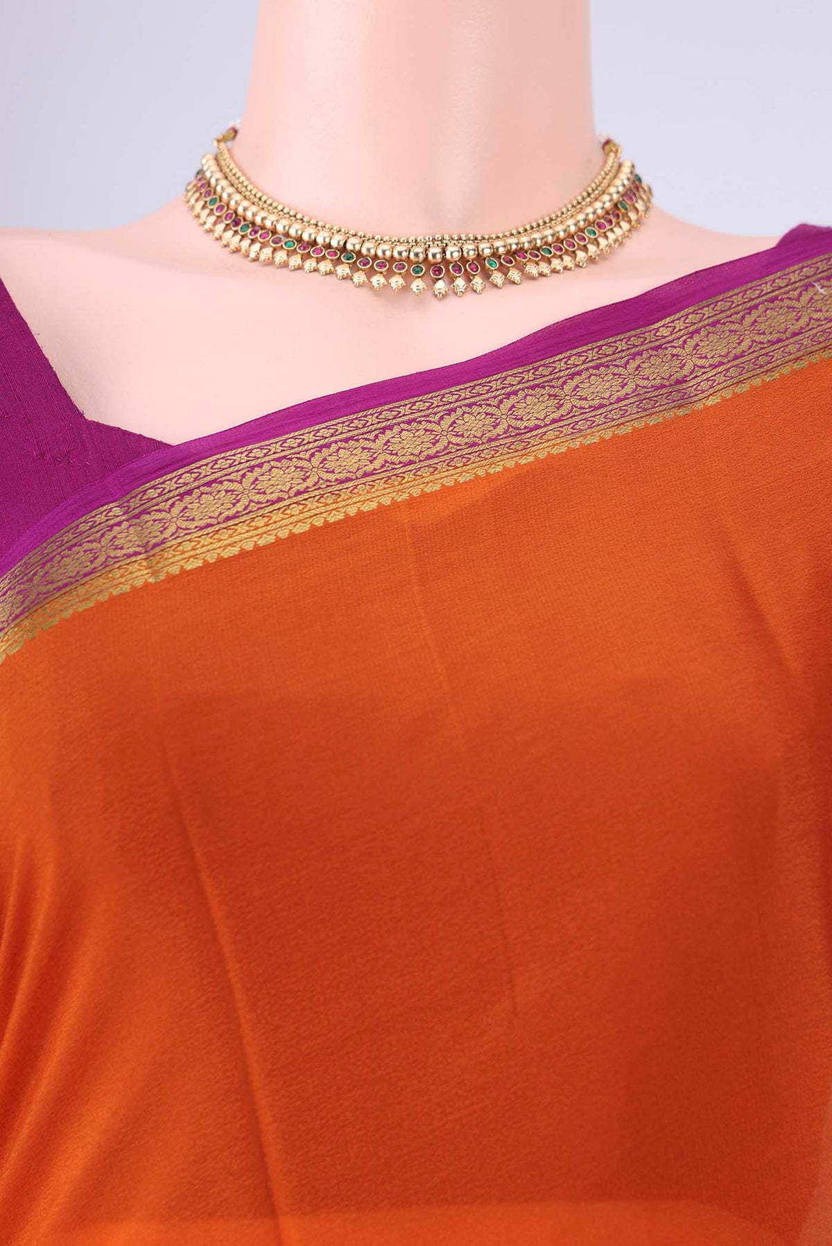 Border image of Orange Mysore Crepe Saree with Plain Body and Zari Border. 