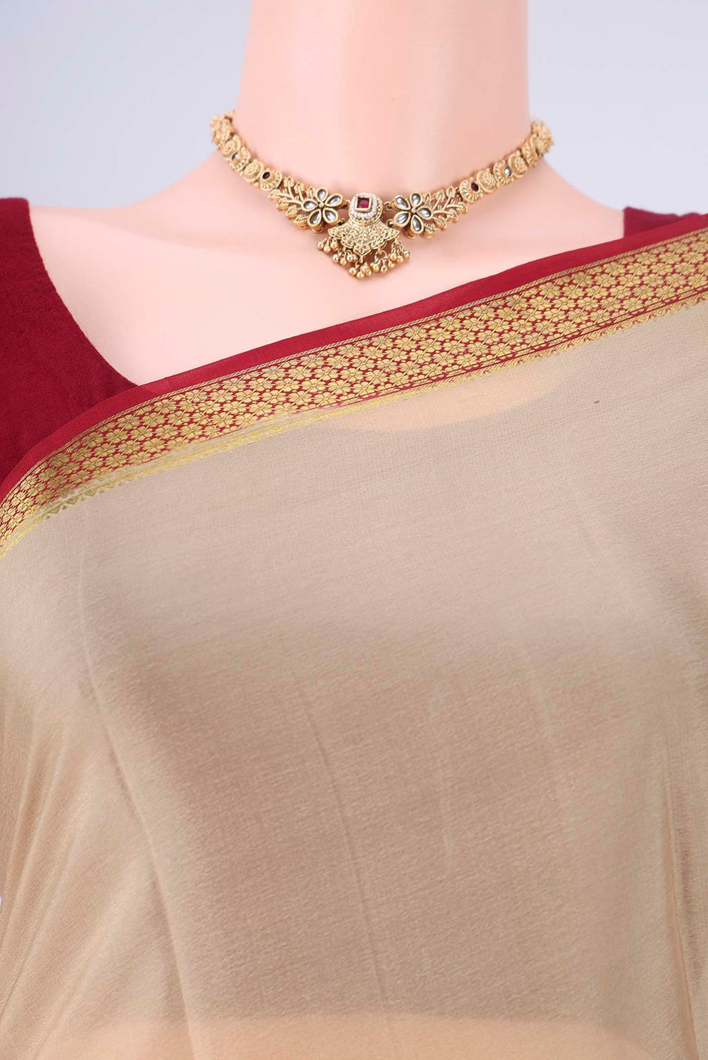 Border image of Beige Mysore Crepe Saree with Plain Body and Zari Border. 