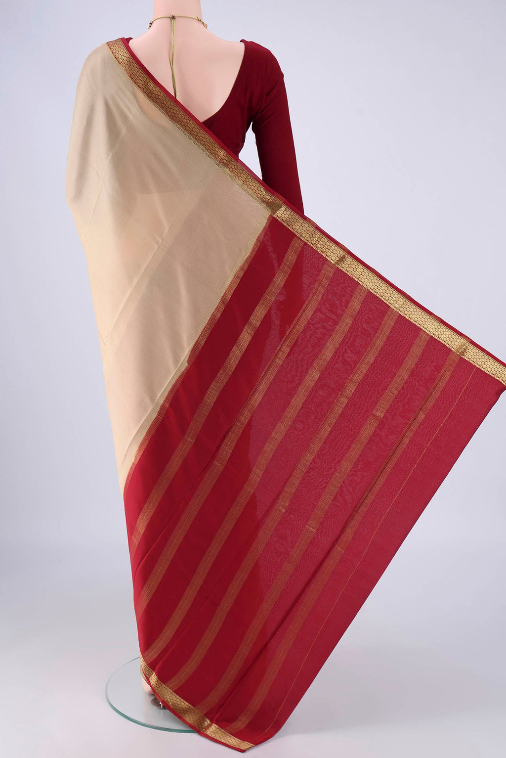 Flat view of Beige Mysore Crepe Saree with Plain Body and Zari Border. 