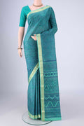 Sea Green Printed Silk Saree with Printed design on the body and Zari Border.  displayed on a mannequin