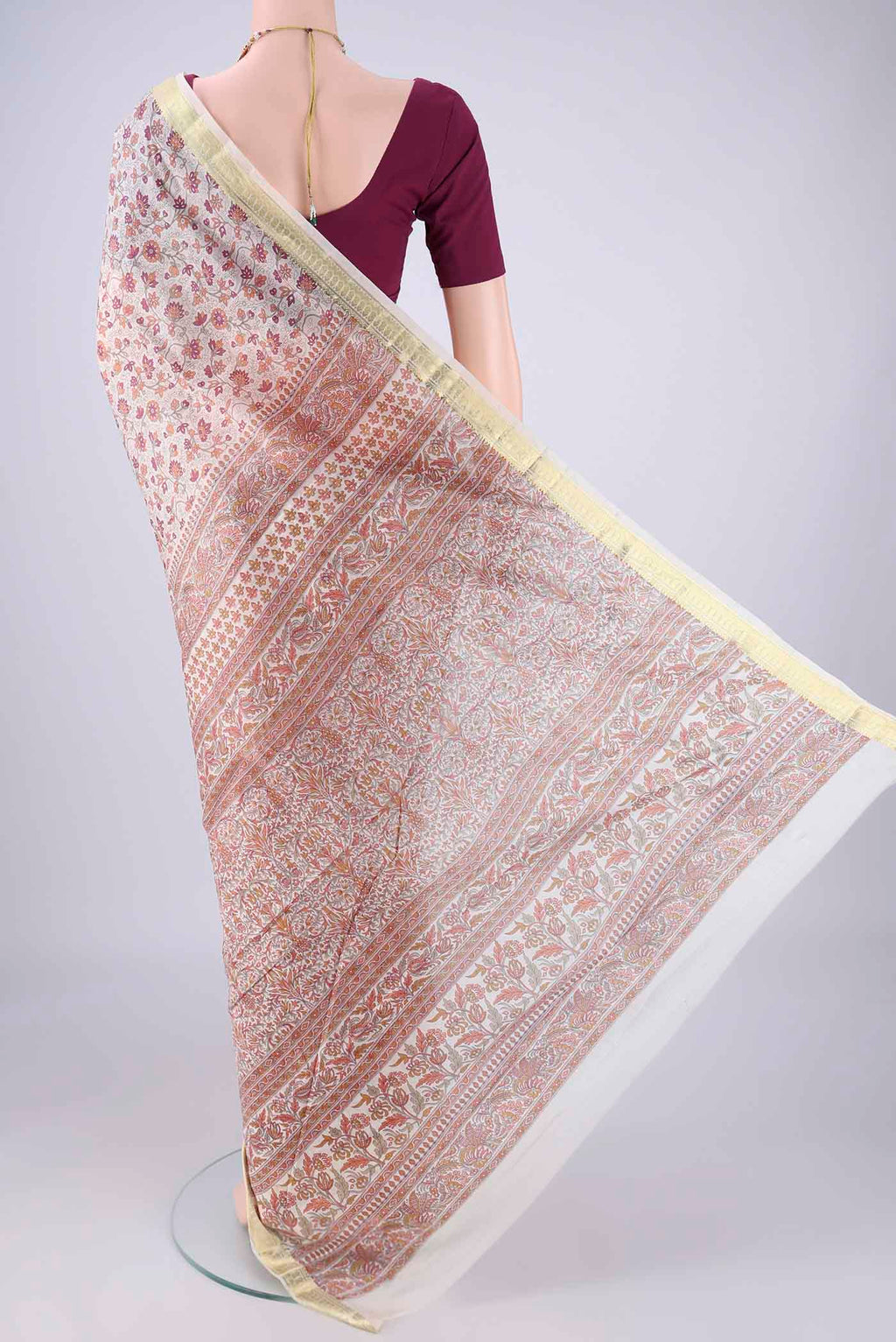 Flat view of Off White Printed Silk Saree with Printed design on the body and Zari Border. 