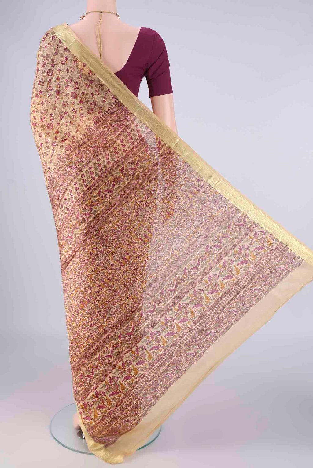 Flat view of Beige Printed Silk Saree with Printed design on the body and Zari Border. 