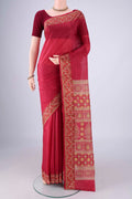 Maroon Printed Silk Saree with Plain Body and Printed Border.  displayed on a mannequin