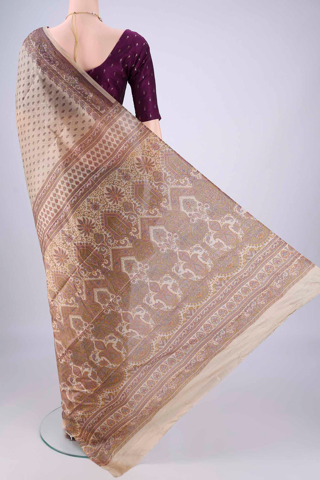 Flat view of Beige Printed Silk Saree with Printed design on the body and Printed Border. 