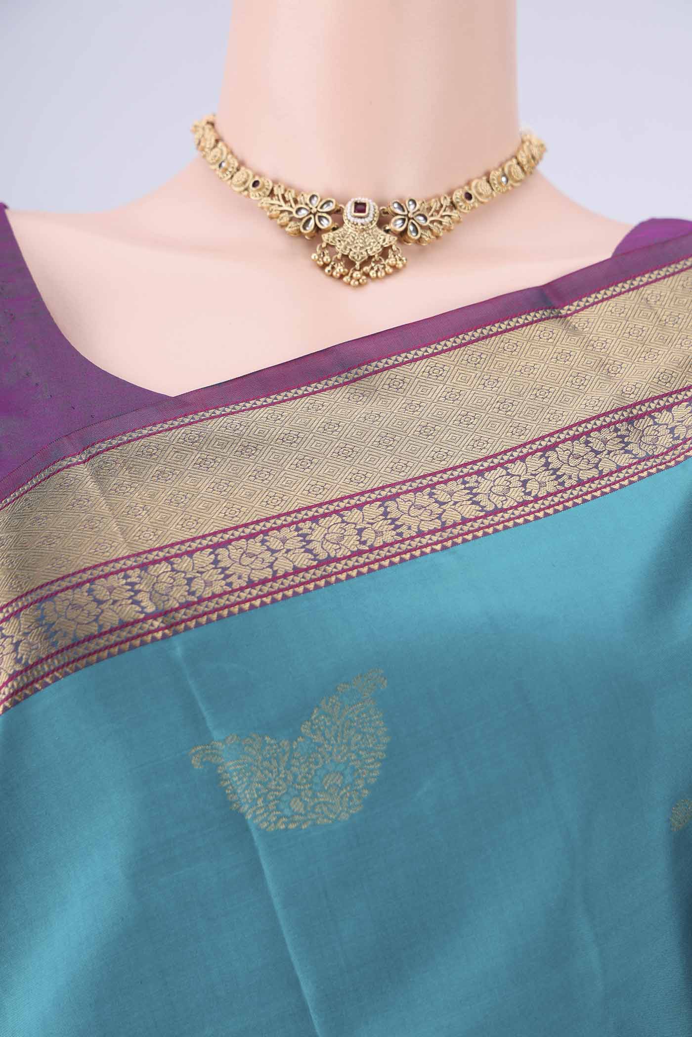Border image of Sea Green Nangavalli Silk [ Salem ] Saree with Zari Butta on the body and Zari Border. 