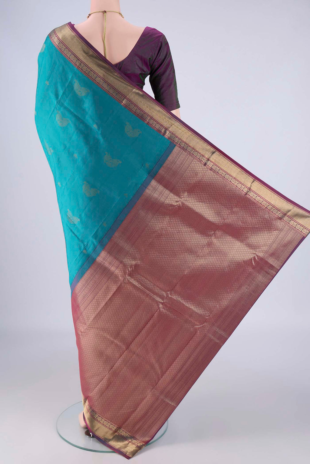 Flat view of Sea Green Nangavalli Silk [ Salem ] Saree with Zari Butta on the body and Zari Border. 