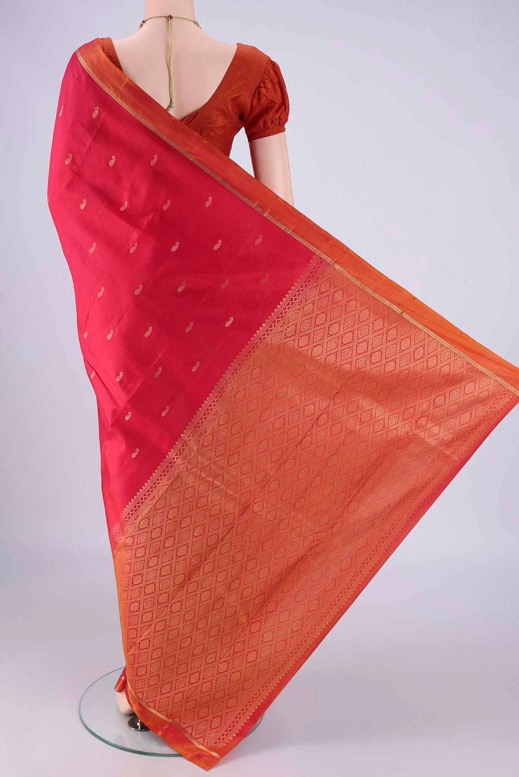 Flat view of Red Nangavalli Silk [ Salem ] Saree with Zari Butta on the body and Zari Border. 