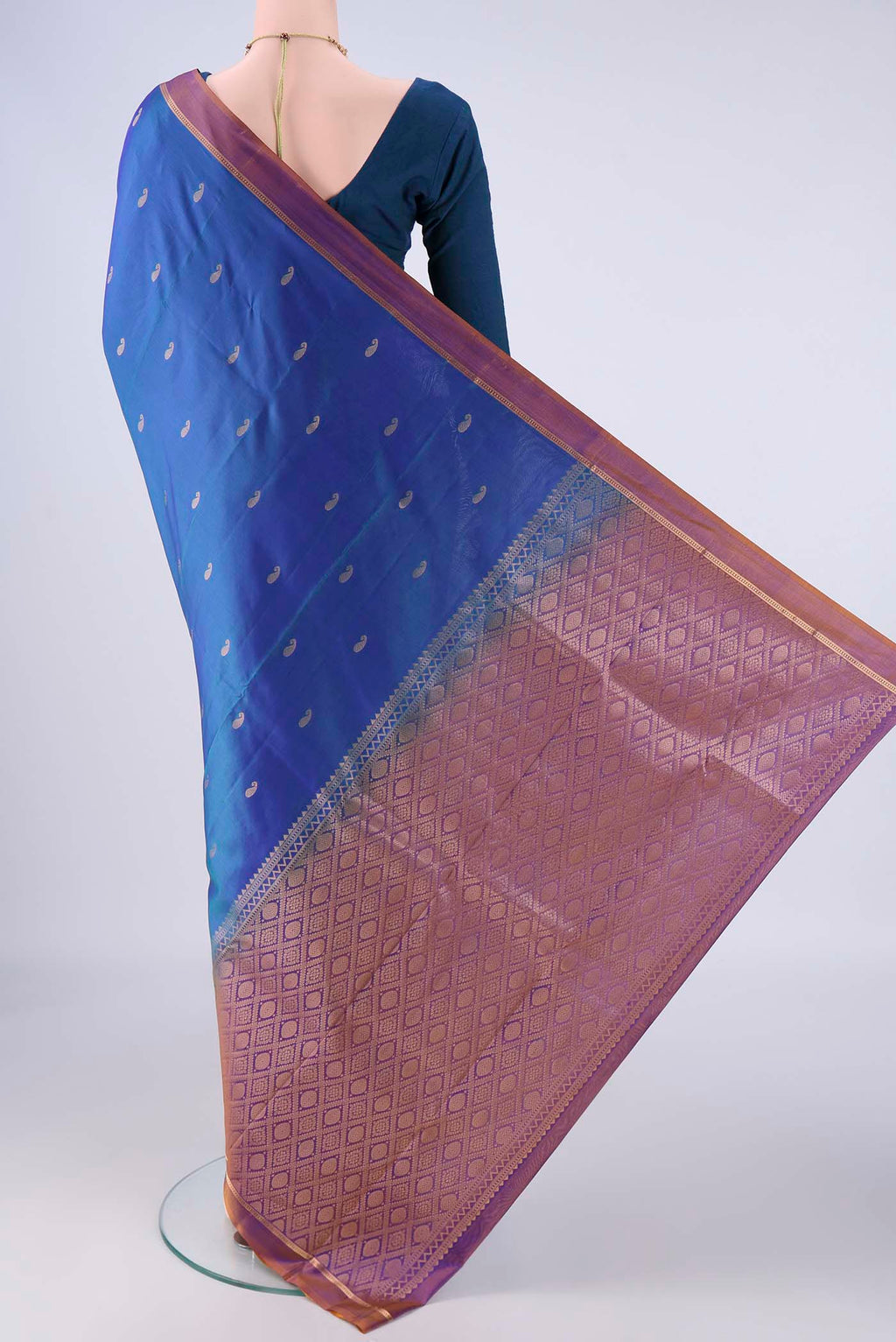 Flat view of Peacock Blue Nangavalli Silk [ Salem ] Saree with Zari Butta on the body and Zari Border. 