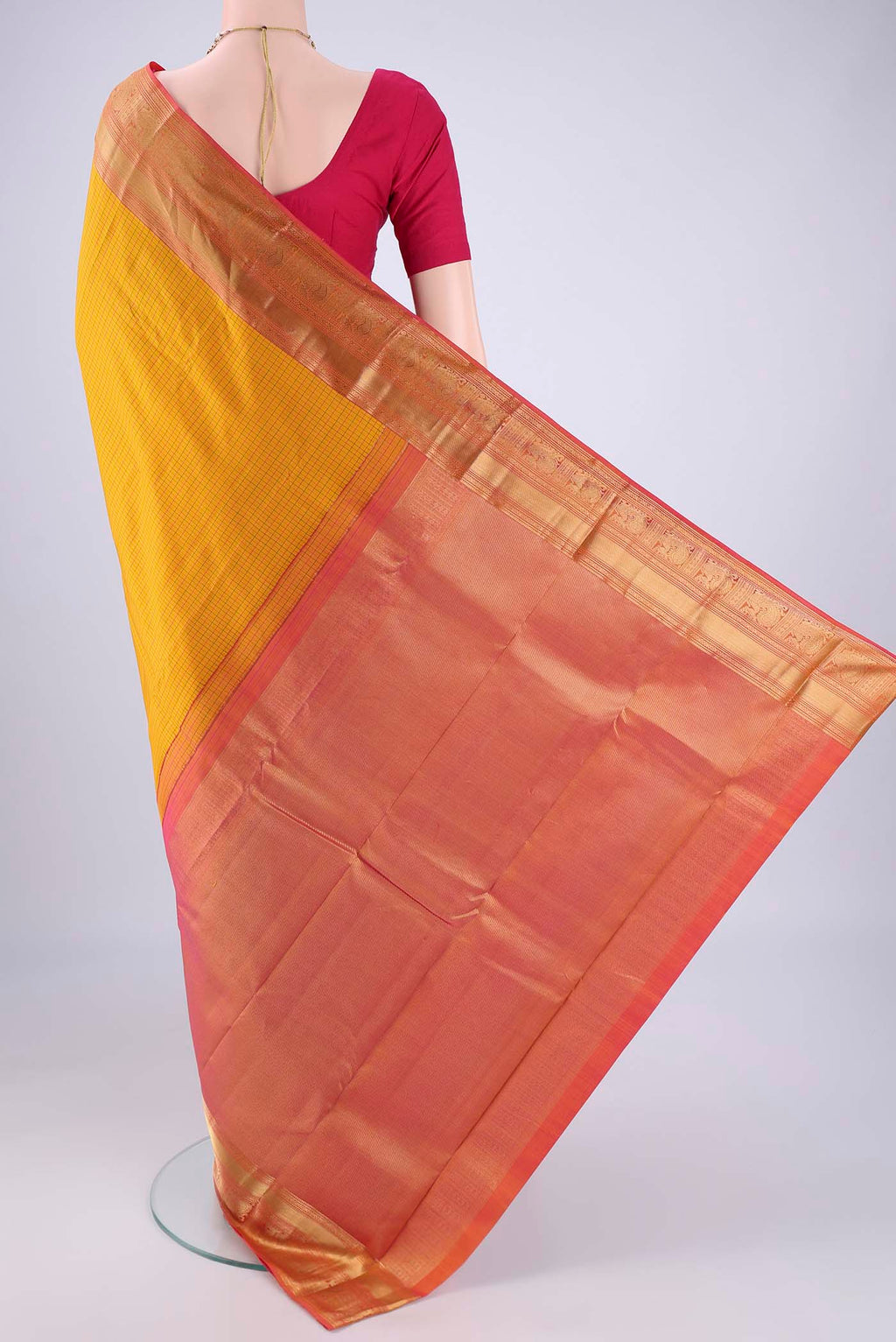 Flat view of Mustard Kanchipuram Silk Saree with Checked design on the body and Zari Border. 