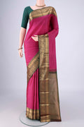Rani Pink Kanchipuram Silk Saree with Checked design on the body and Zari Border.  displayed on a mannequin