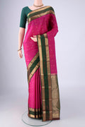 Rani Pink Kanchipuram Silk Saree with Zari Butta on the body and Zari Border.  displayed on a mannequin