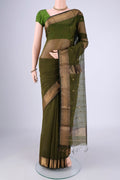 Mehandi Green Maheshwari Silk Cotton Saree with Zari Butta on the body and Zari Border.  displayed on a mannequin