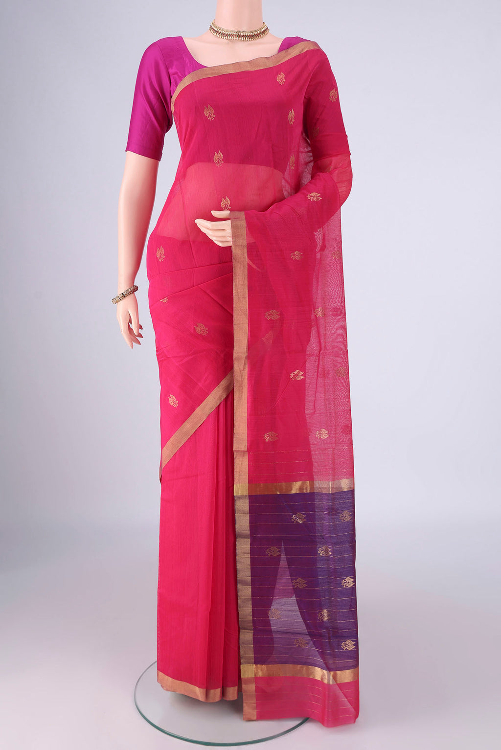 Pink Chanderi Silk Cotton Saree with Zari Butta on the body and Zari Border.  displayed on a mannequin