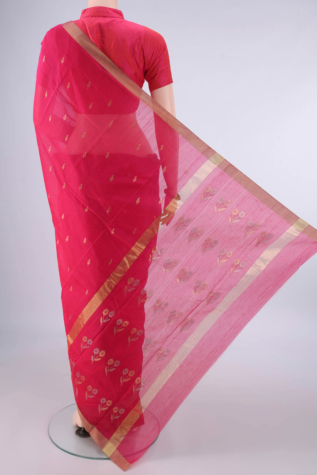 Flat view of Dark Pink Chanderi Cotton Saree with Zari Butta on the body and Zari Border. 