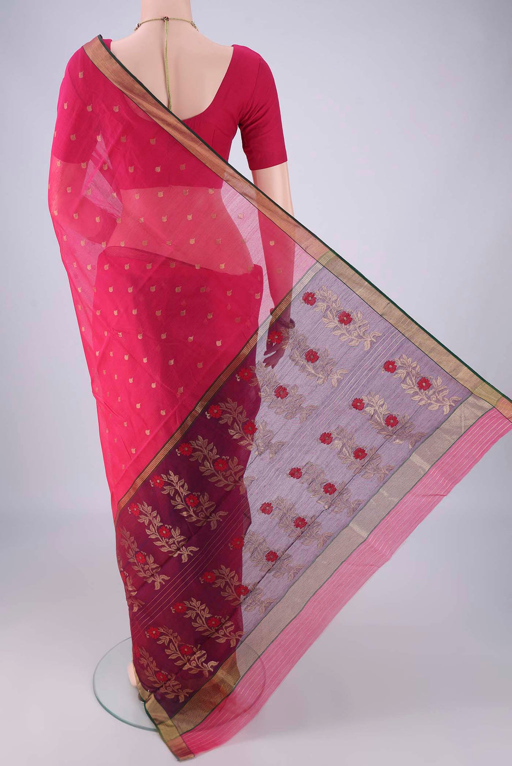 Flat view of Rani Pink Chanderi Silk Cotton Saree with Zari Butta on the body and Zari Border. 