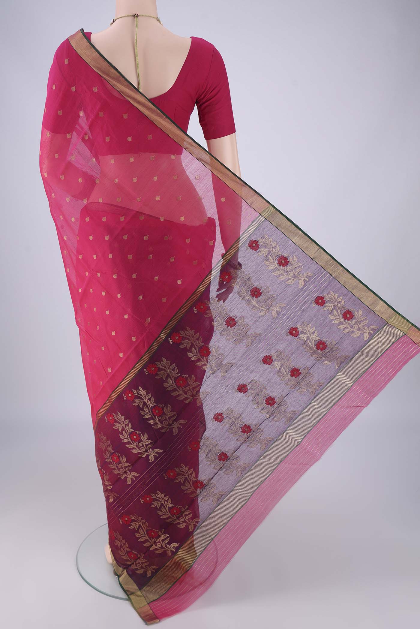 Flat view of Rani Pink Chanderi Silk Cotton Saree with Zari Butta on the body and Zari Border. 