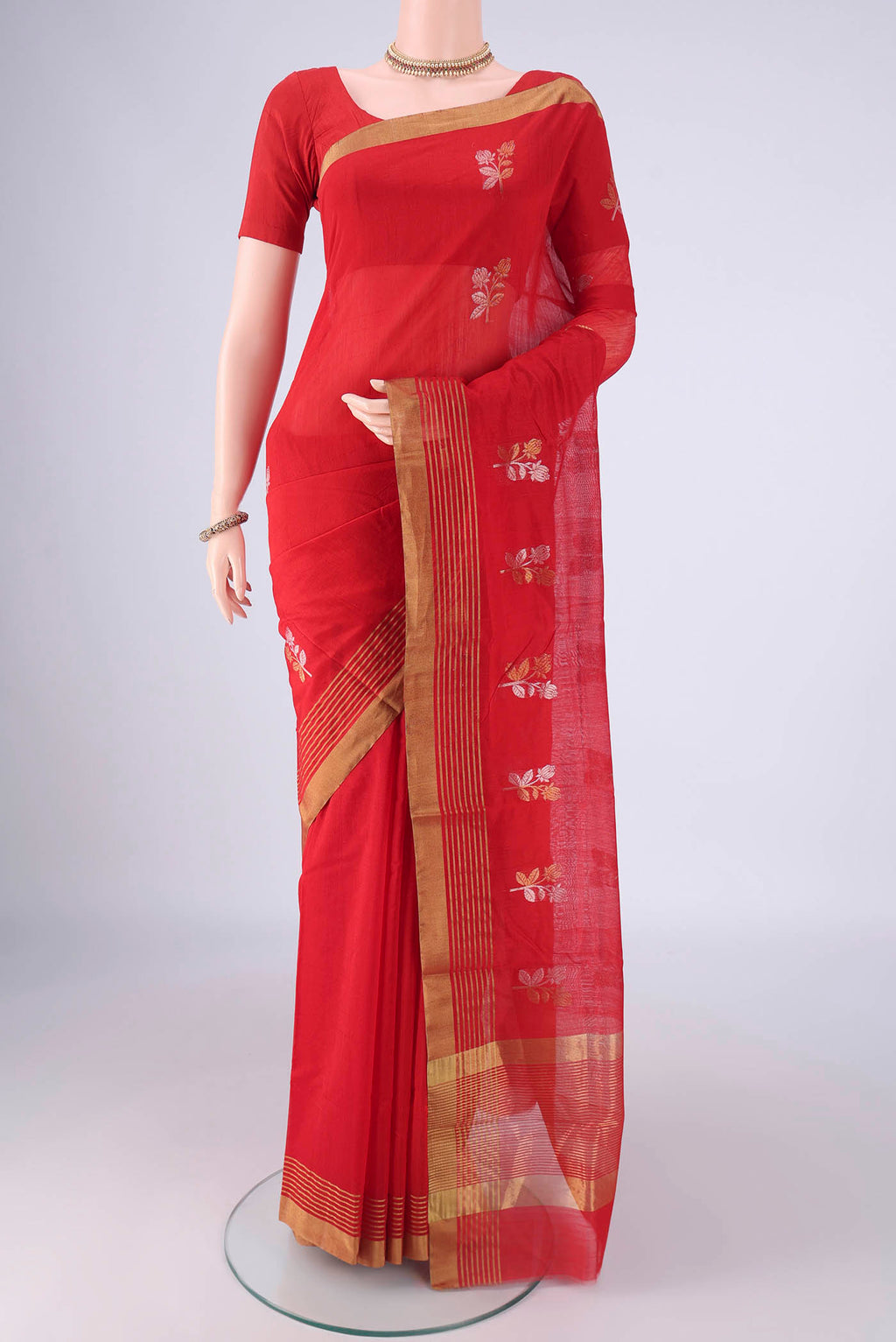 Red Chanderi Silk Cotton Saree with Zari Butta on the body and Zari Border.  displayed on a mannequin