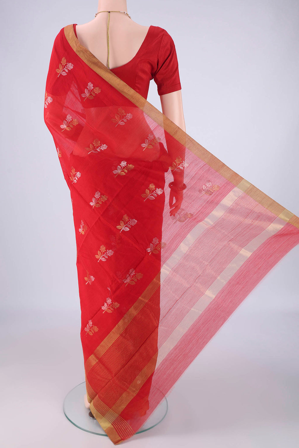 Flat view of Red Chanderi Silk Cotton Saree with Zari Butta on the body and Zari Border. 