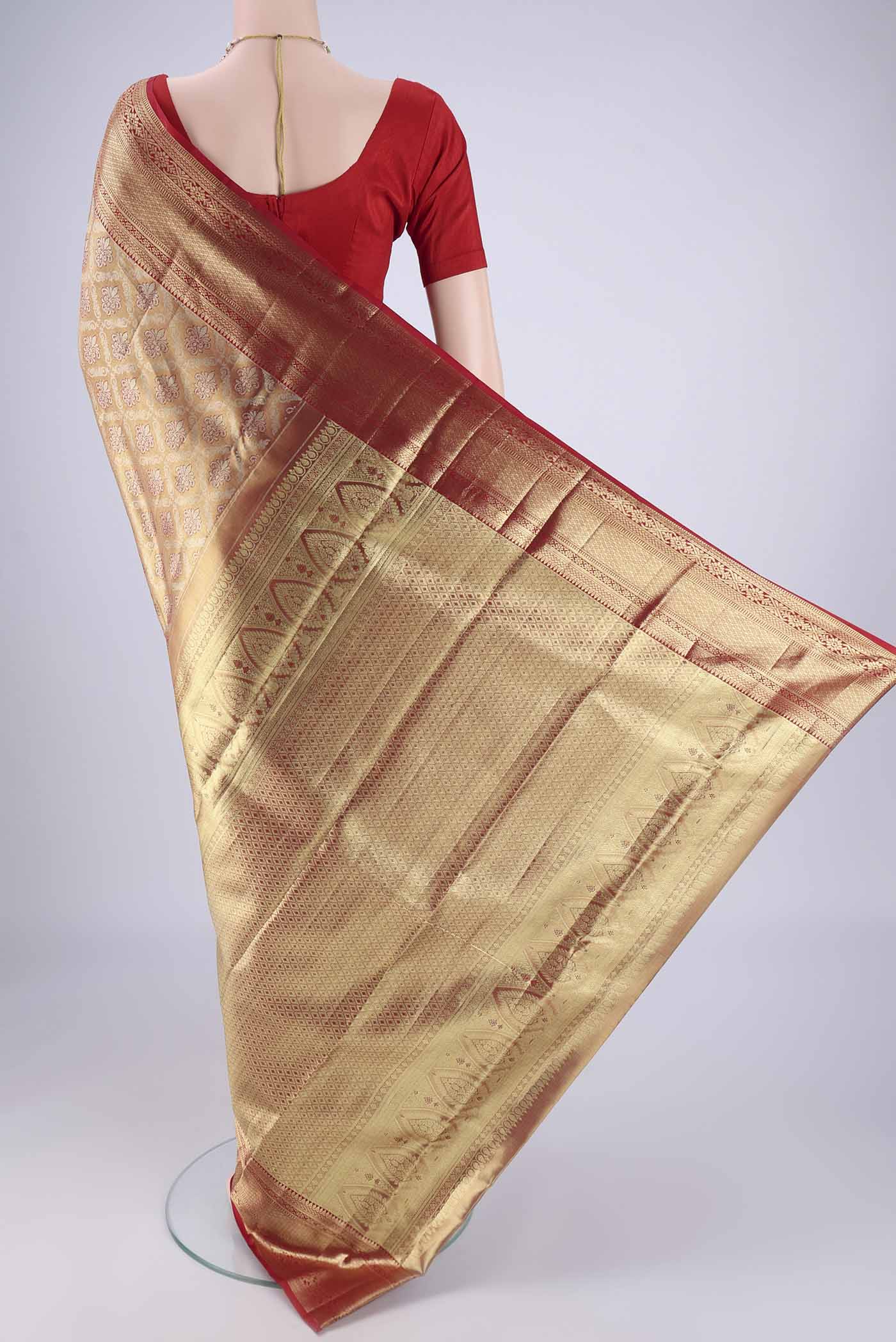Flat view of Golden Dual Tone Kanjivaram Tissue Silk Saree with Zari Brocade on the body and Zari Border. 