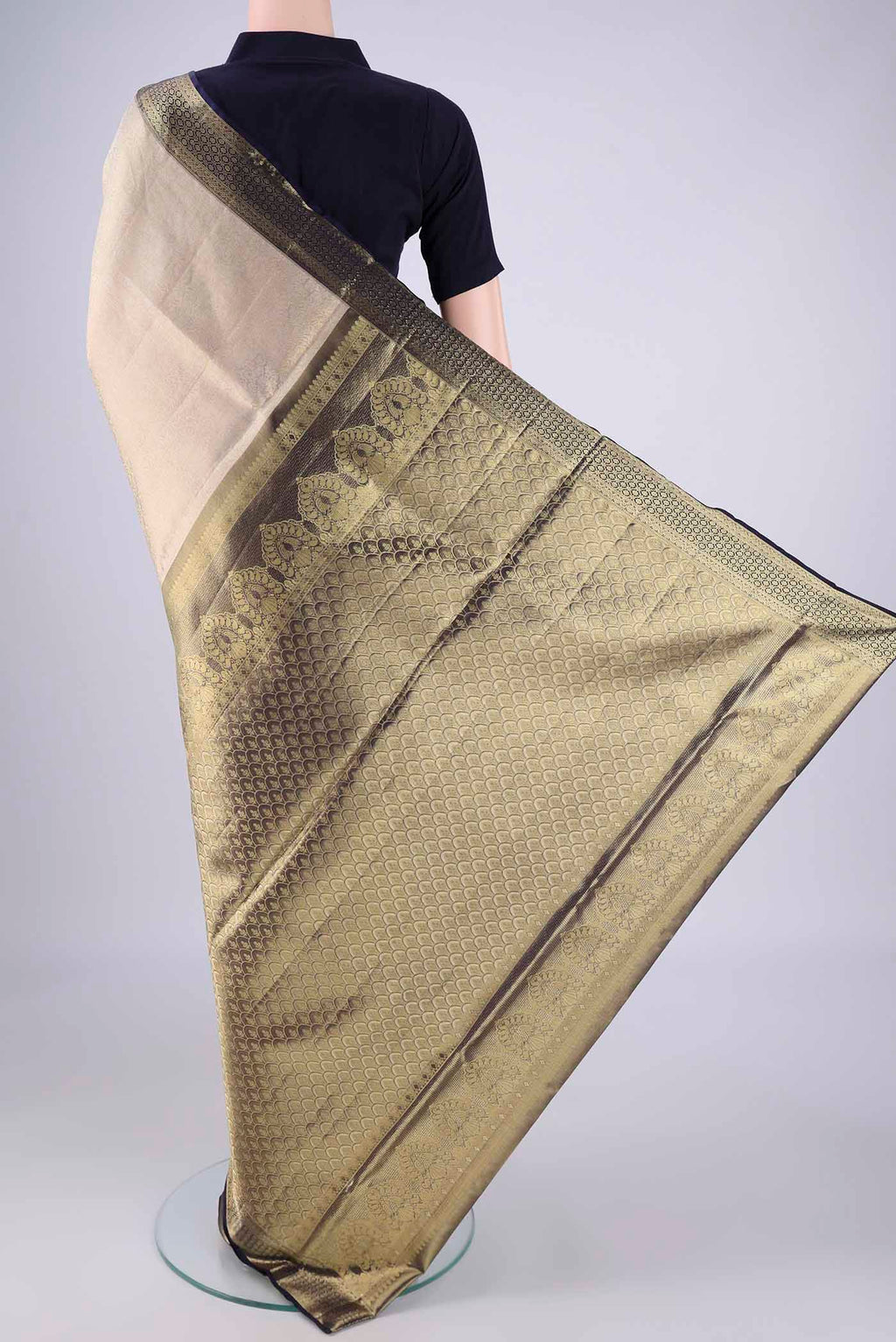 Flat view of Golden Dual Tone Kanchipuram Tissue Silk Saree with Zari Brocade on the body and Zari Border. 