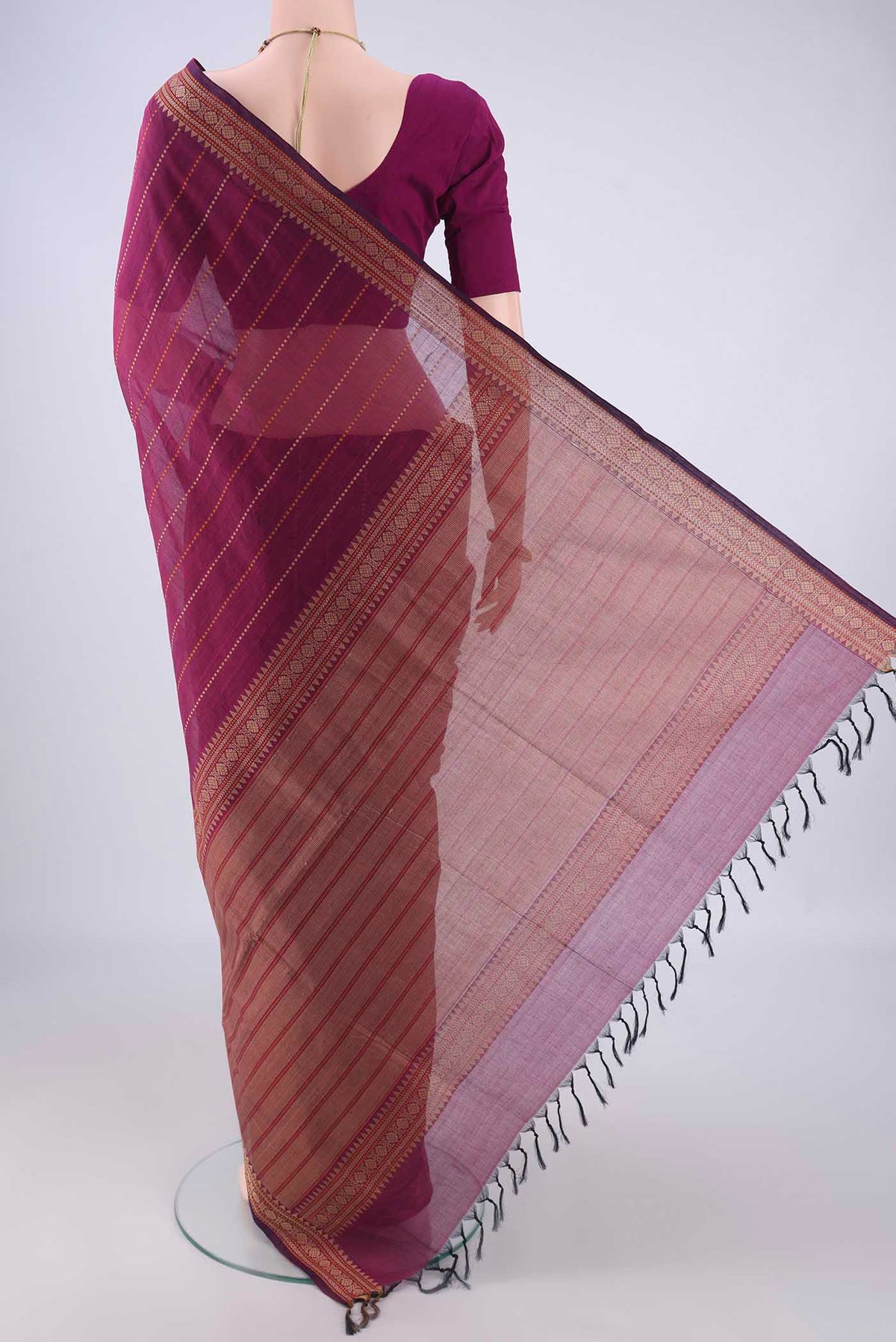 Flat view of Magenta Coimbatore Cotton Saree with Stripes on the body and Thread Border. 