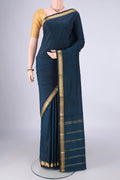Blue Blended Bangalore Silk Saree with Jacquard design on the body and Zari Border.  displayed on a mannequin